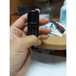 Мини мобилен телефон с блу тут който може да се използва и кате хендс фрии със слушалка тапа в комплекта както и като самостоятелен микро текефон