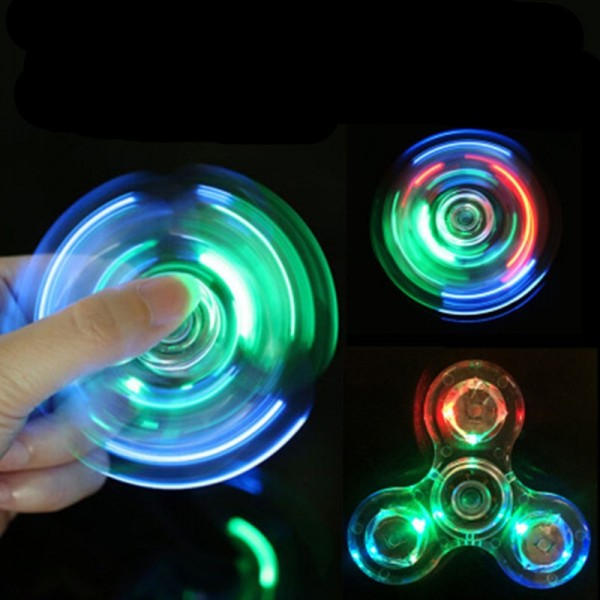 Прозрачен фиджет спинер светещ в тъмното при въртене с LED / ЛЕД светлина, в различни цветови композици 